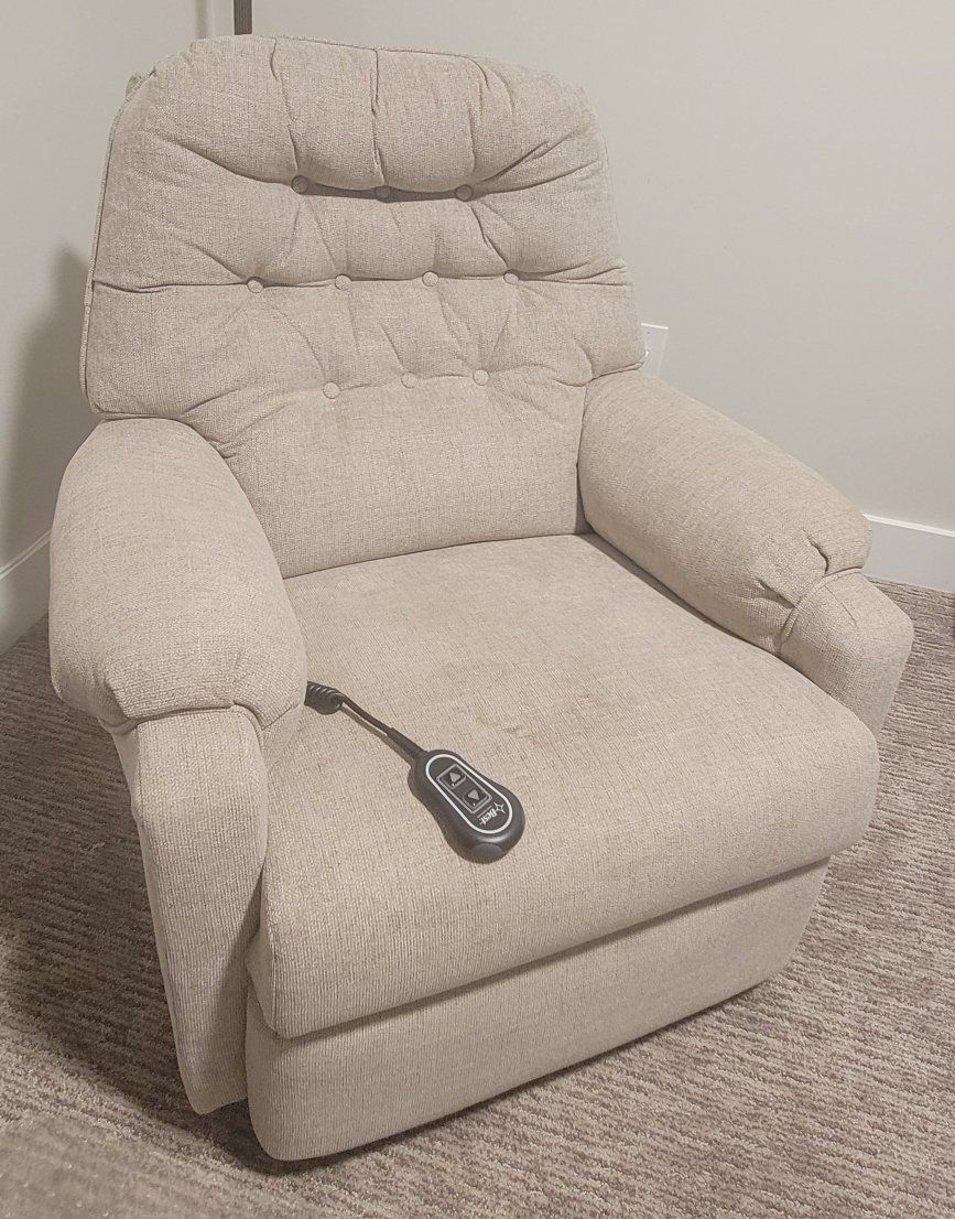 Rocking recliner, electronic, only 1 yr old