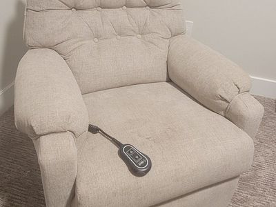 Rocking recliner, electronic, only 1 yr old