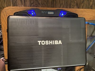 Toshiba Laptop with adjustable cooling stand