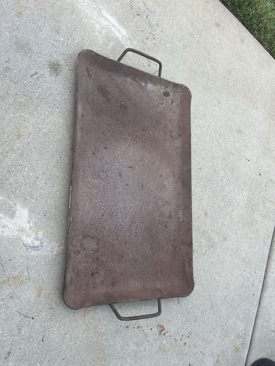 19 1/2 inch long 11 1/2 wide homemade Dutch oven barbecue skillet.