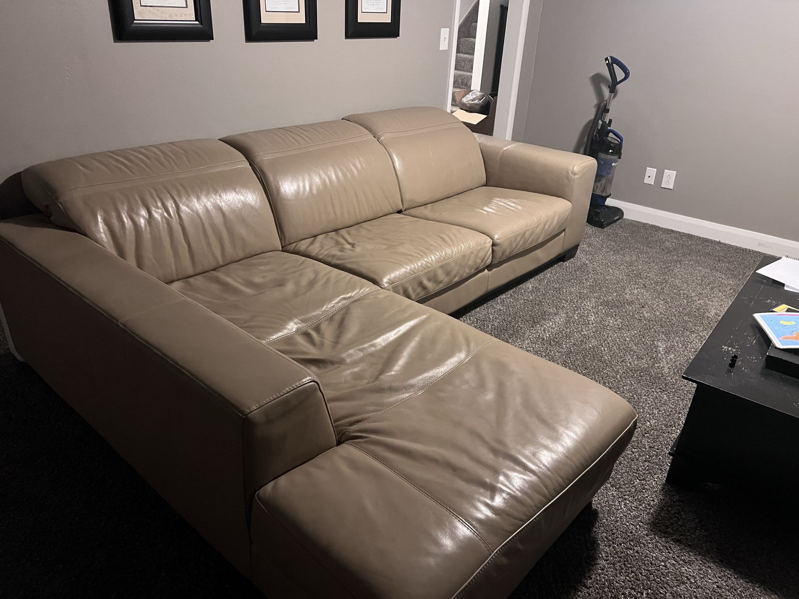 Faux leather beige colored sectional couch