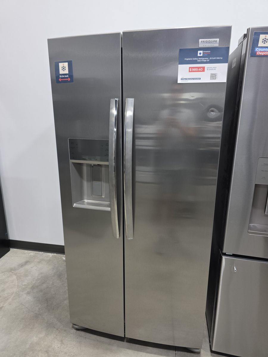 Side by Side Refrigerator — Stainless Steel, Brand New, Minor Cosmetic Only