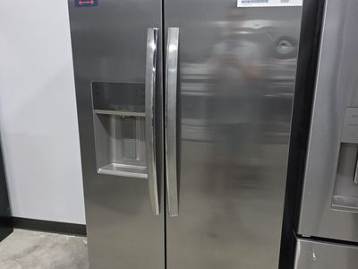 Side by Side Refrigerator — Stainless Steel, Brand New, Minor Cosmetic Only