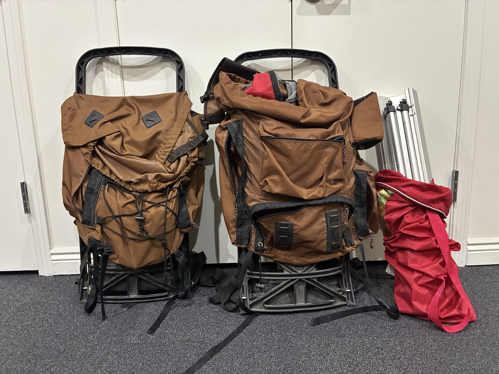 2 Camp Trails Explorer External Frame Backpacks, aluminum table, misc supplies
