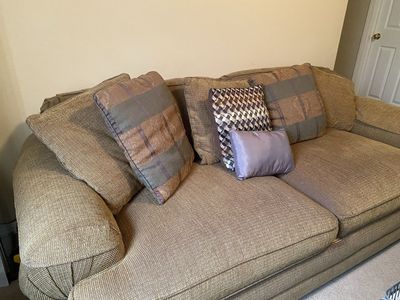 Cozy Brown Sofa and Matching Oversized Chair & Ottoman Set - Excellent Condition with Throw Pillows