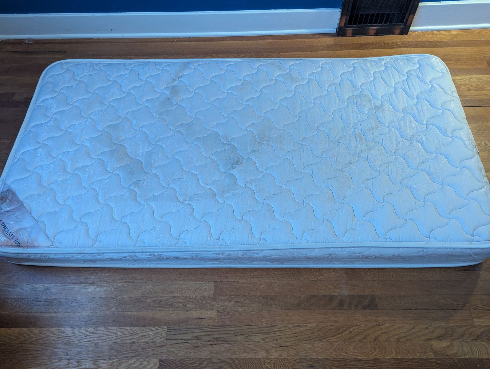 Two Twin mattresses plus one foam top