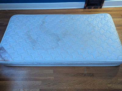 Two Twin mattresses plus one foam top