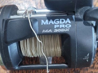 Okuma Magda Pro MA-20DX Fishing Reel with Depth Counter. I have 4, very little use. in great condition. I paid 85.00 for each.