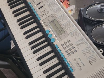 Casio LK-220 Key Lighting Electronic Keyboard 400 Tones 150 Rhythms