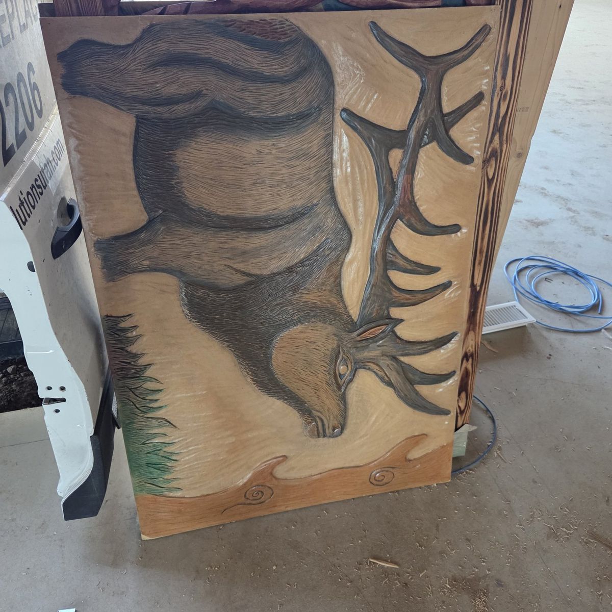 hand carved wooden elk