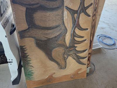 hand carved wooden elk
