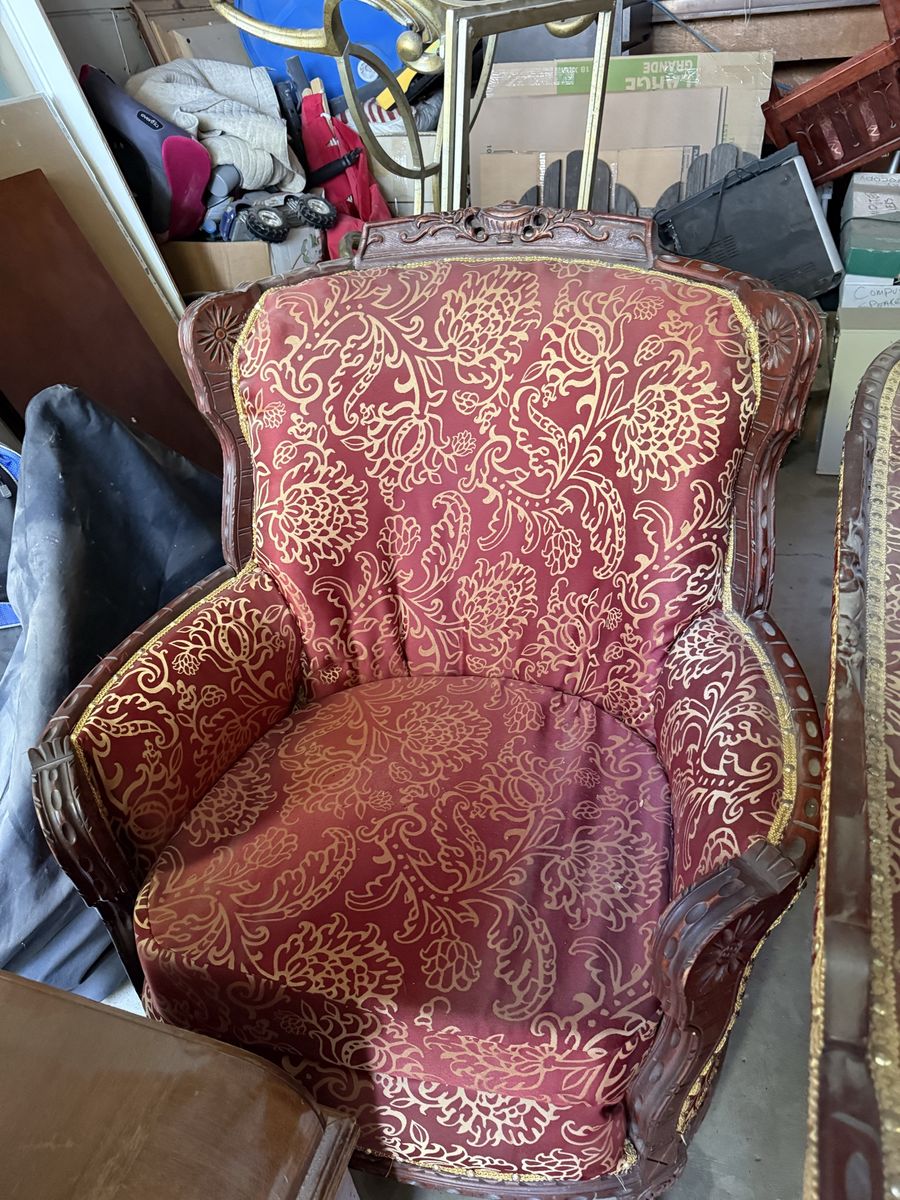Ornate Upholstered Armchair - Red & Gold Floral Pattern, Carved Wood Frame