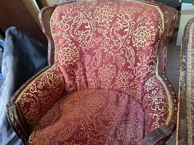 Ornate Upholstered Armchair - Red & Gold Floral Pattern, Carved Wood Frame