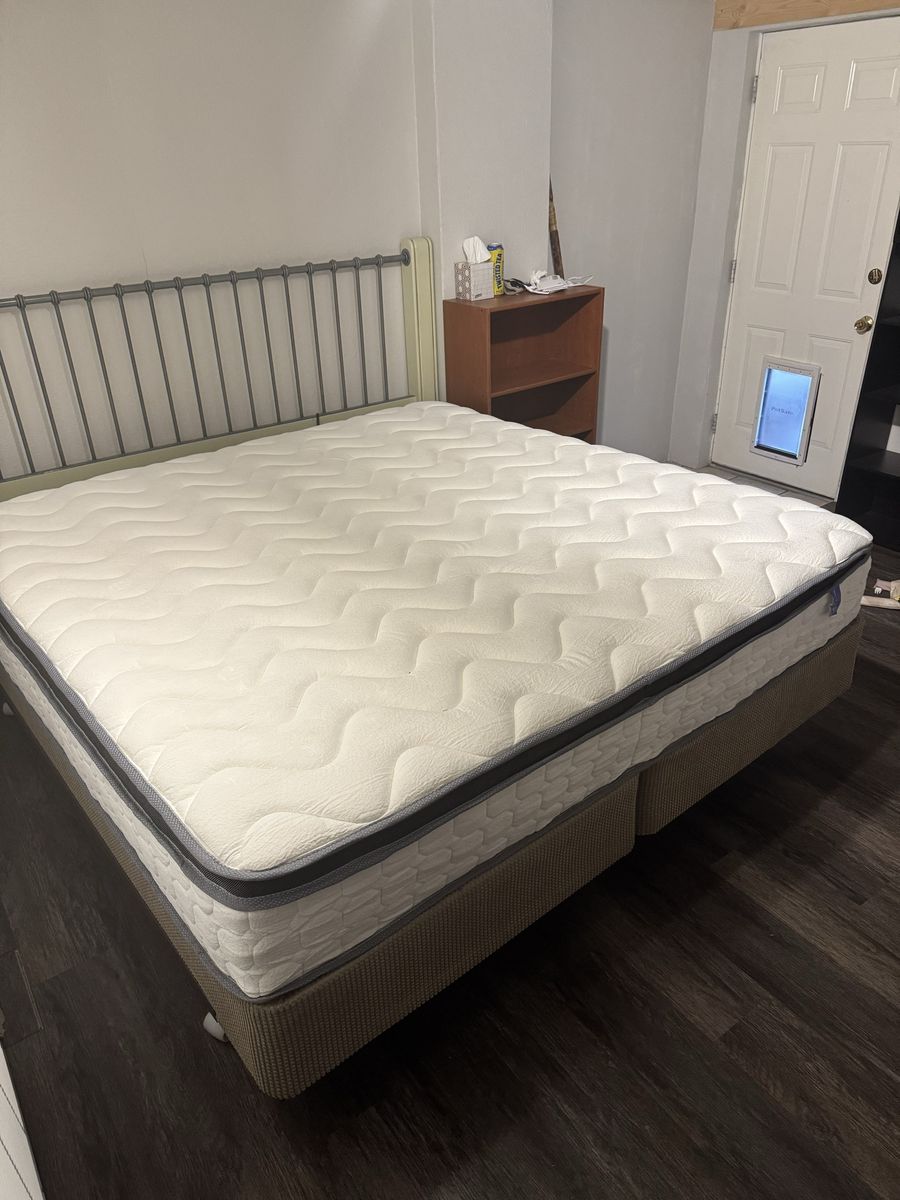 King size bed + mattress (mattress was bought new 6 months). Headboard, rails, & box springs included. Very comfortable!