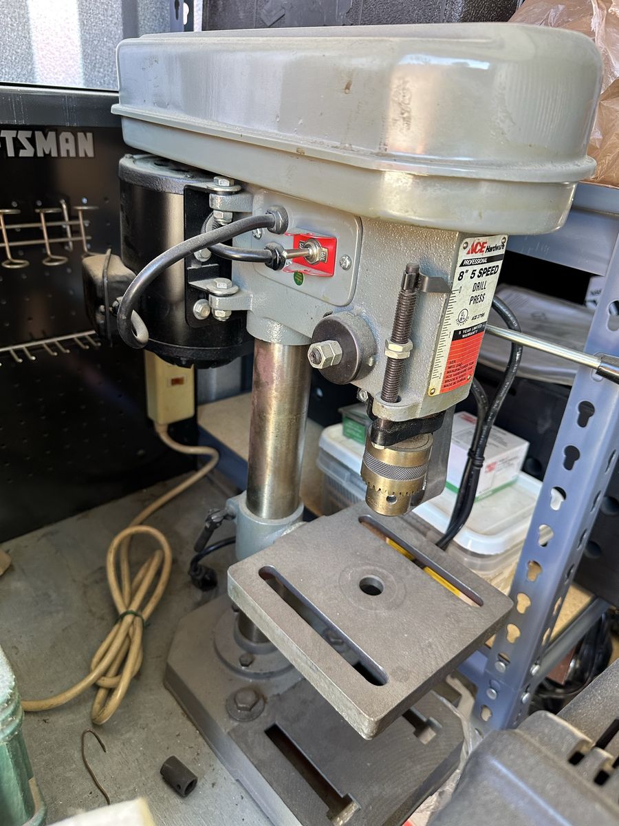 Drill press with metal cabinet-workbench