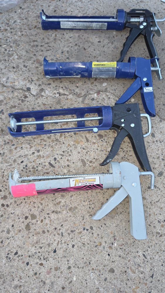 Drywall tools. Caulking guns