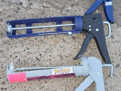 Drywall tools. Caulking guns