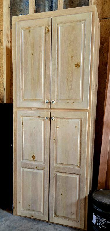 Tall pine  wood cabinet