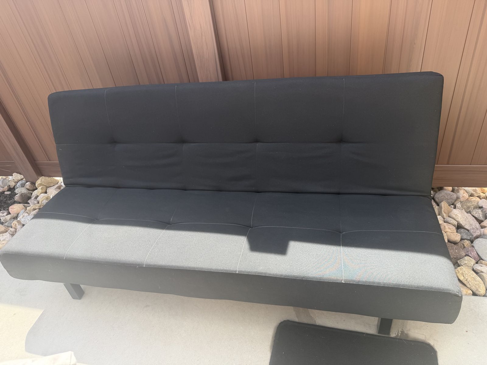 Black futon sofa indoor/outdoor