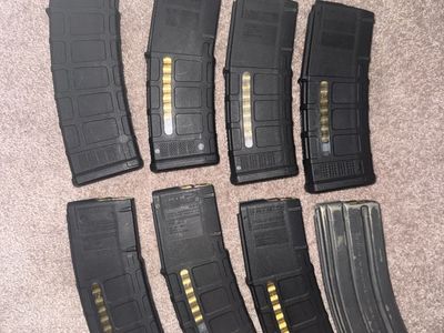 8 AR mags loaded with green tip