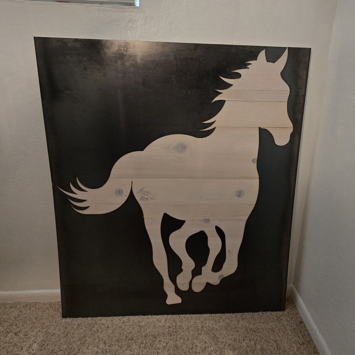 metal and wood horse