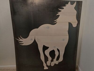 metal and wood horse
