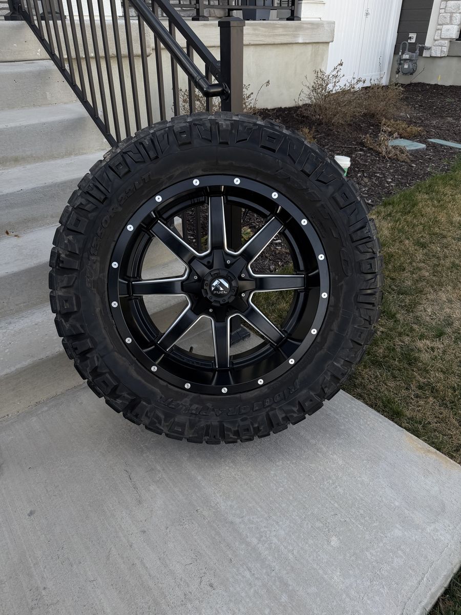 Dodge Ram 3500 Rims and Tires 37/13.50R22 Nitto