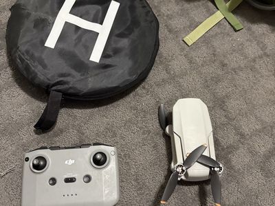 DJI Mini 2 4K Drone Bundle with RC-N1 Controller and Landing Pad