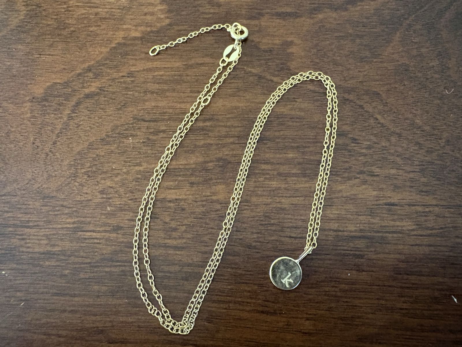 New Gold Tone Necklace w/ a K on a Small Circle 