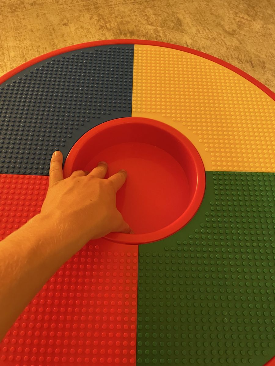 Colorful Lego table with storage for Lego’s in the middle