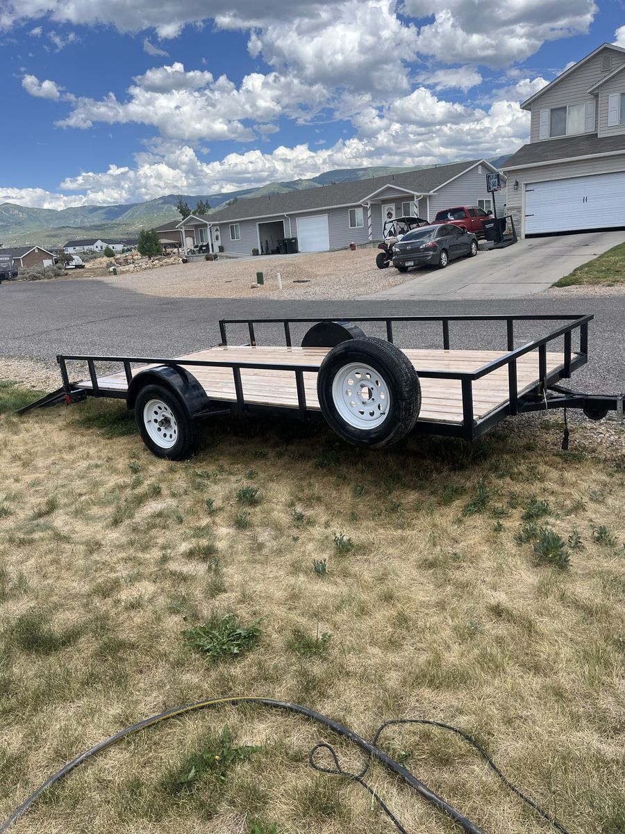 2019 Big Bubba Utility Trailer,7 X 14 new wood bed, signal axle.