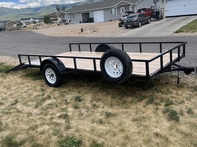 2019 Big Bubba Utility Trailer,7 X 14 new wood bed, signal axle.