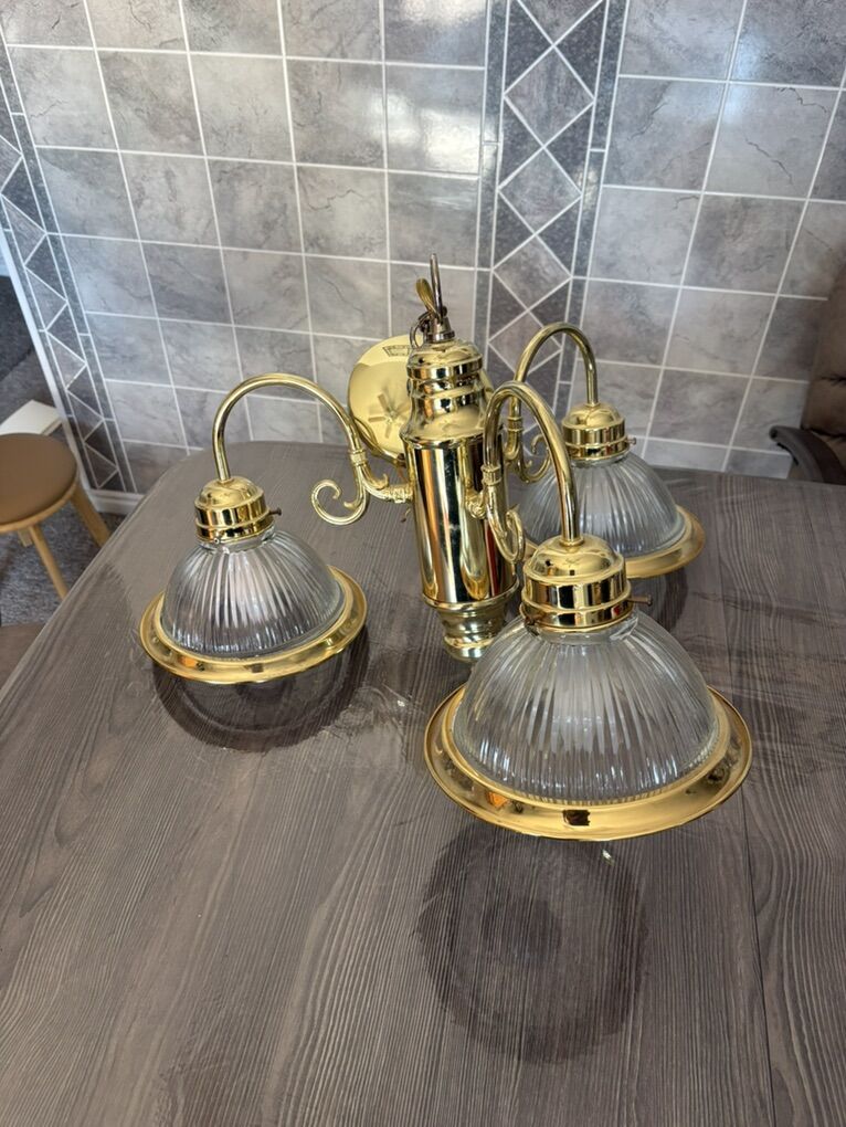 Golden Colored Chandelier With Three Lights