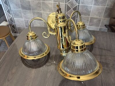 Golden Colored Chandelier With Three Lights