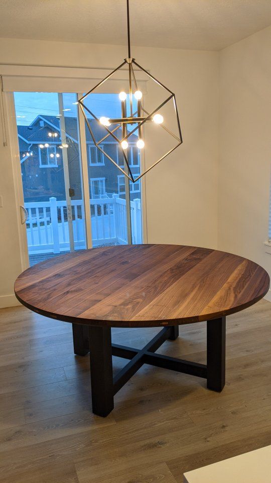 Solid walnut dining table with metal legs