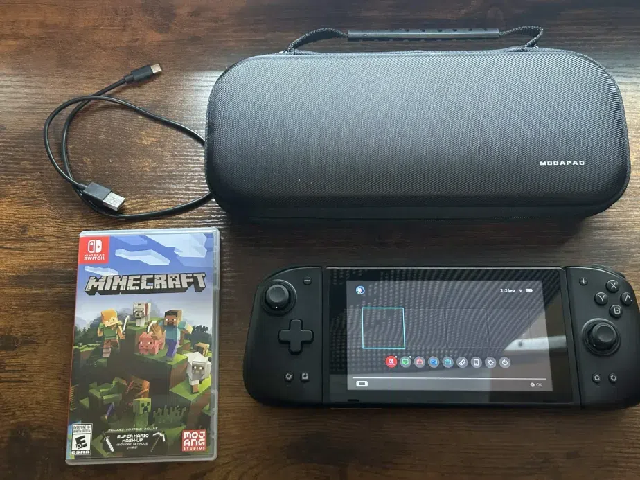 Nintendo Switch with Mobapad JoyCons, Carrying Case & Minecraft Game + Controller