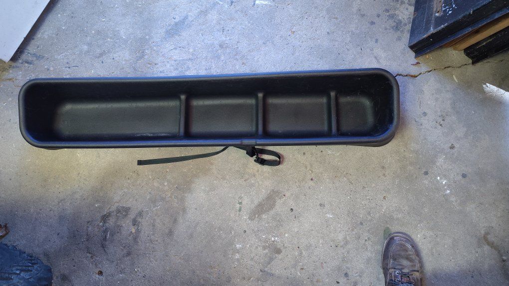 Rear seat under storage