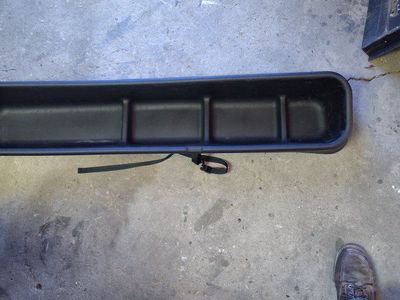 Rear seat under storage