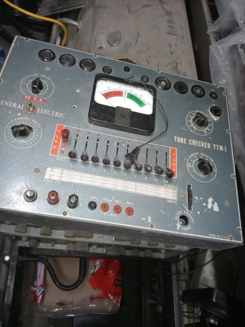 tube tester and four boxes. of tunes