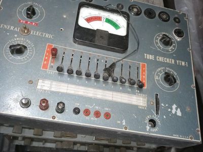 tube tester and four boxes. of tunes