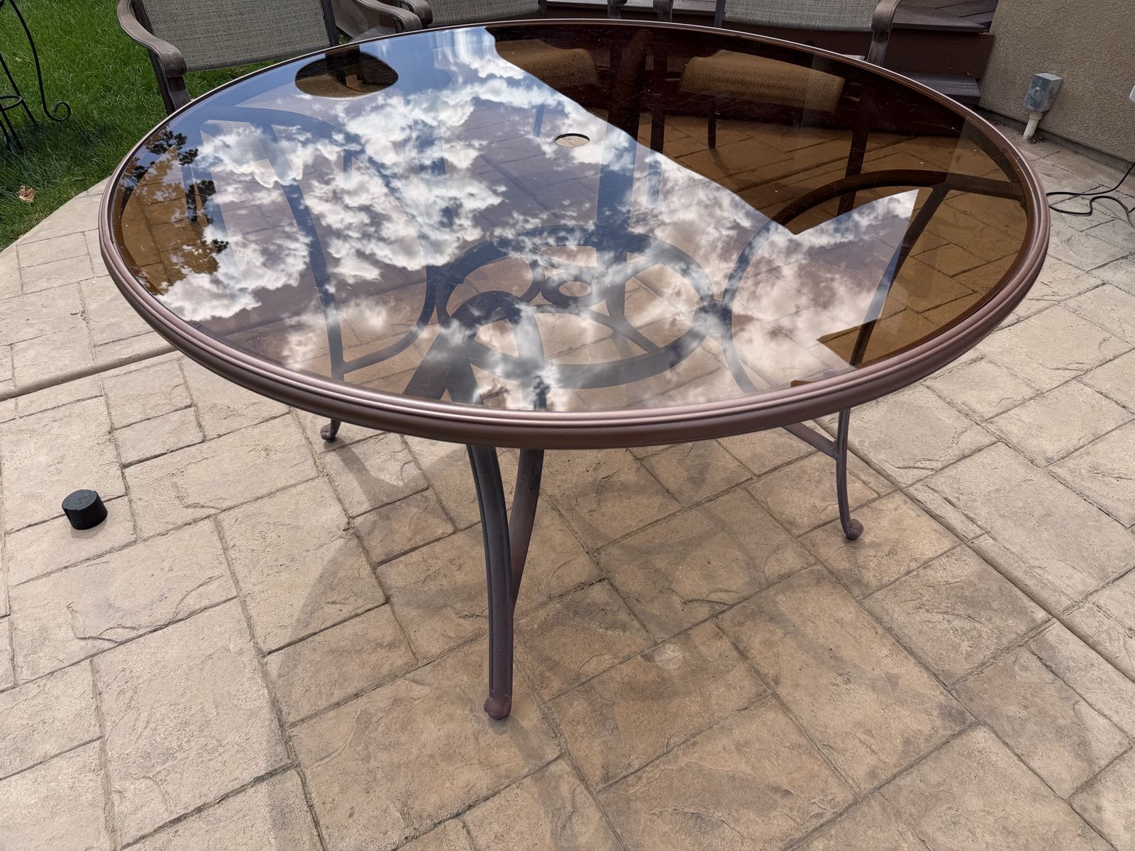 Round patio table, tilt umbrella and cast iron umbrella base