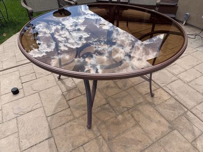 Round patio table, tilt umbrella and cast iron umbrella base