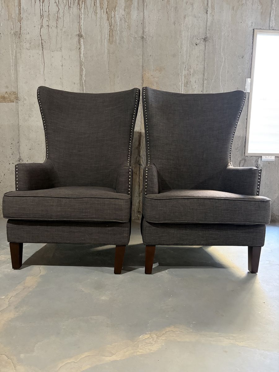 Pair of Charcoal Gray Wingback Accent Chairs with Nailhead Trim
