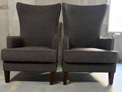 Pair of Charcoal Gray Wingback Accent Chairs with Nailhead Trim