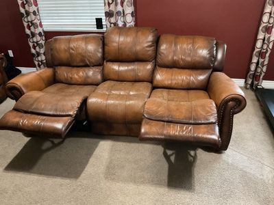 Manual reclining brown leather sofa and loveseat