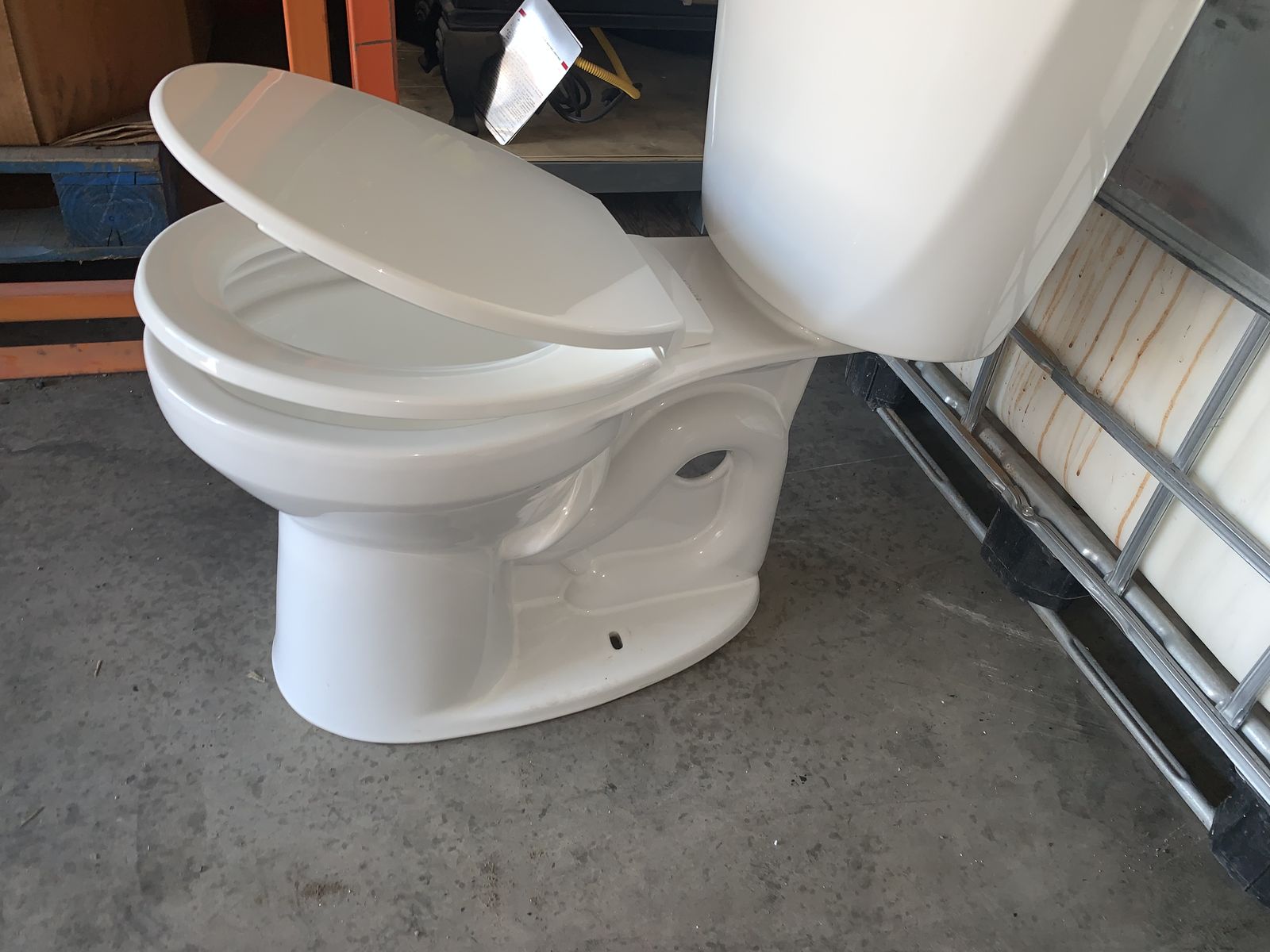 Comfort height Kohler toilet in like new condition
