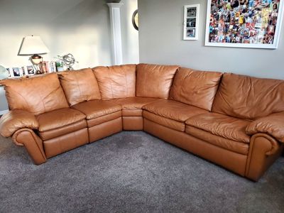 Leather Sectional with Recliner & Sofa Bed
