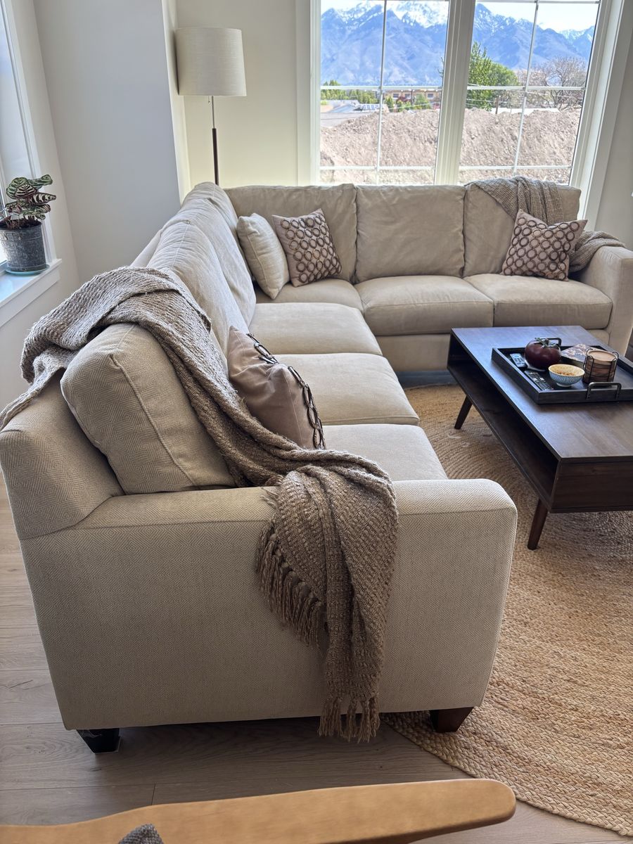 Beautiful Cream/Beige Sectional Sofa. Classic style with clean lines. Super comfortable too!