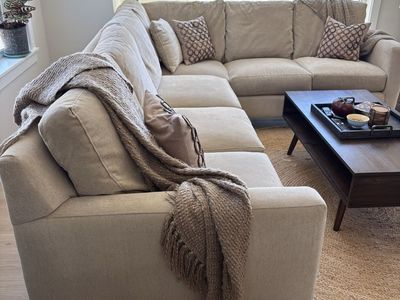 Beautiful Cream/Beige Sectional Sofa. Classic style with clean lines. Super comfortable too!