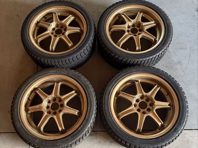 Set of 4 Bridgestone Blizzak Tires Studless 215/45R17 with 17x7 4x100 Winter Wheels
